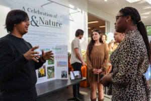 Learning by Leading™ students who have worked on mapping plant collections in the State Botanical Garden present to their peers at the end-of-year showcase. 