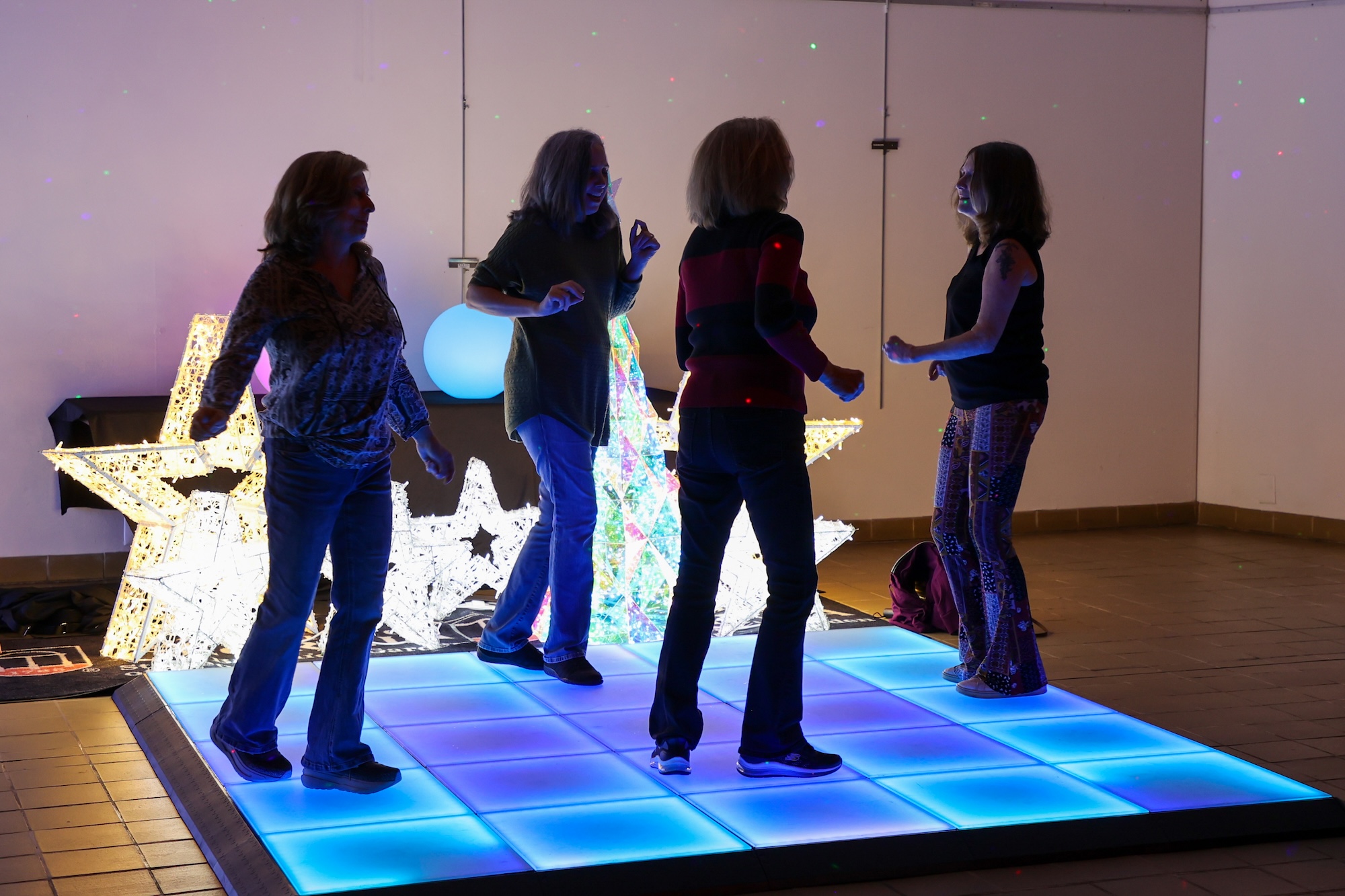 Visitors groove to disco hits at WonderLights Disco Nights. 